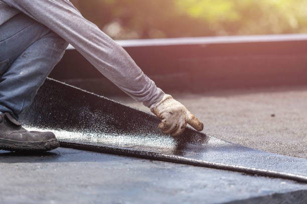 Professional Basement Waterproofing technician working in Milan, IL
